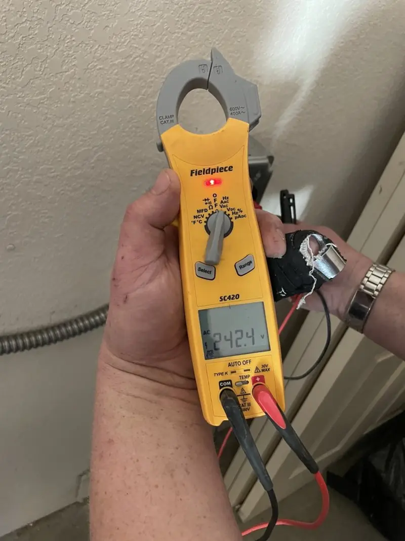 Voltage testing with clamp meter during Electrical Installation Services in Glenn Heights